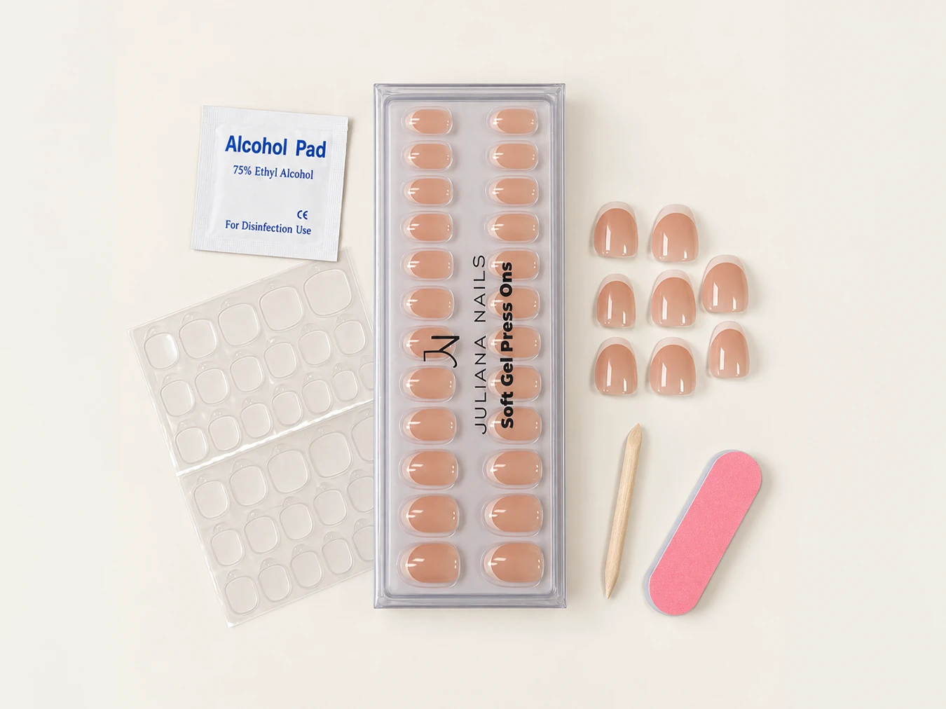 Packungsinhalt der Soft Gel Press Ons mit Tips, Klebestickern, Alkoholpad, Feile und Holzstäbchen